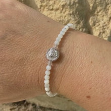 Load and play video in Gallery viewer, Mother of Pearl × Clear Quartz × Silver Hematite × Silver Rose Bracelet
